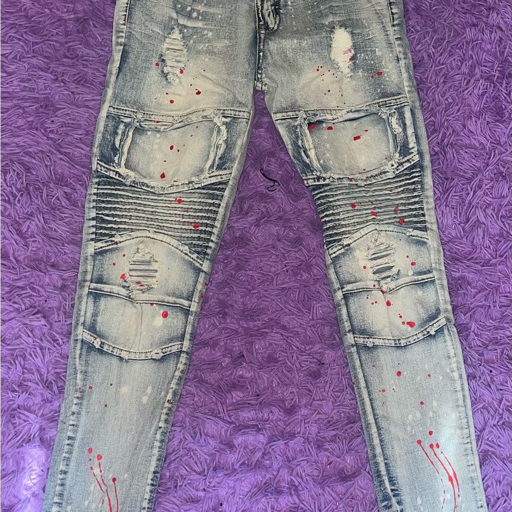 Distressed Blue Wash Jeans with Red Accents